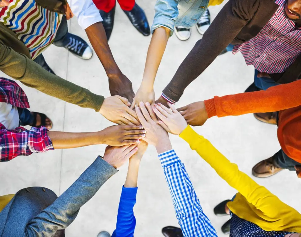 Group of hands in a huddle