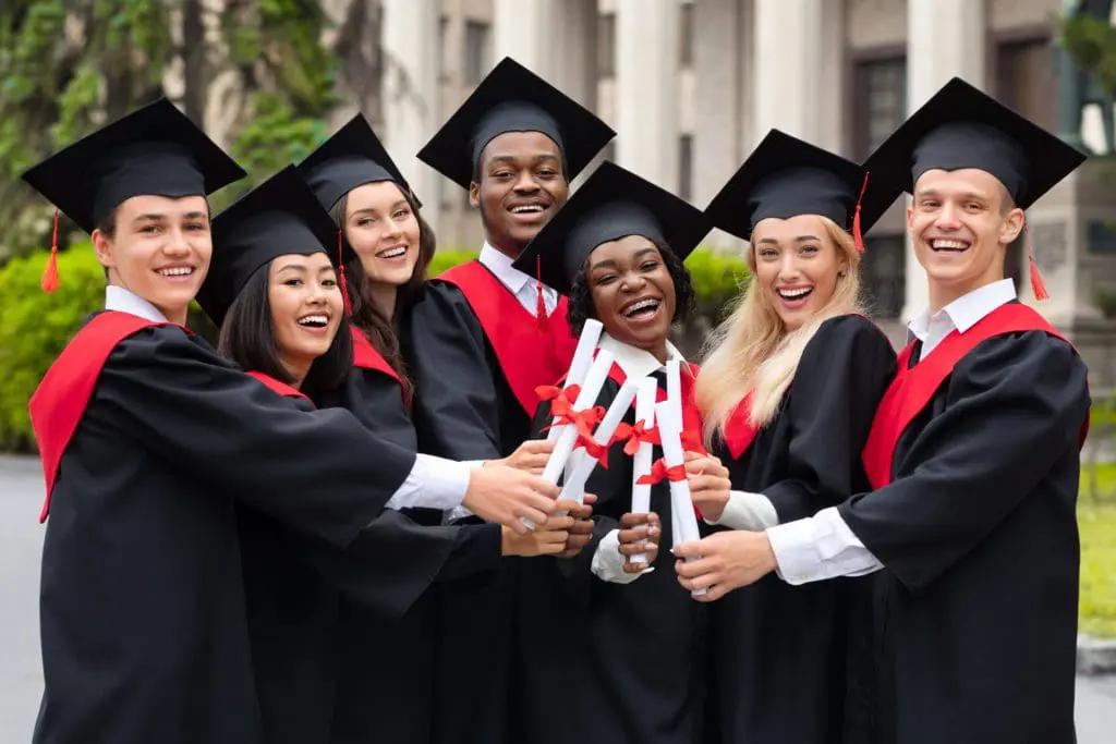 Graduating students in cap and gown