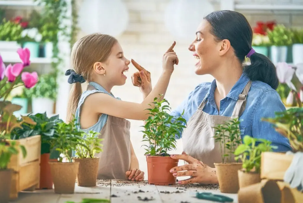 mother and daughter planting in spring
