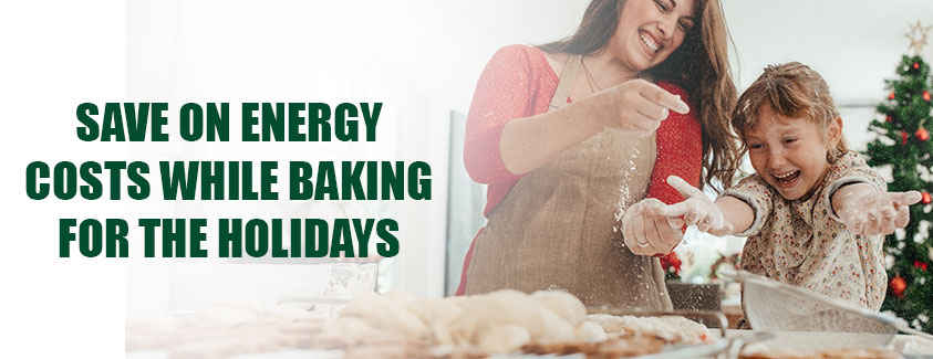 Save on energy costs while baking for the holidays. Image of mom and kid baking.