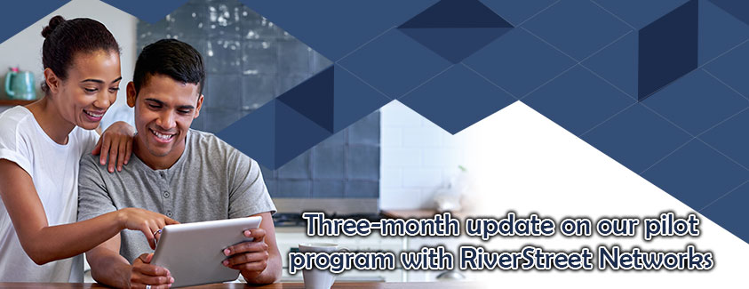 Three-month update on our pilor program with RiverStreet Networks. Image of two people on an ipad.